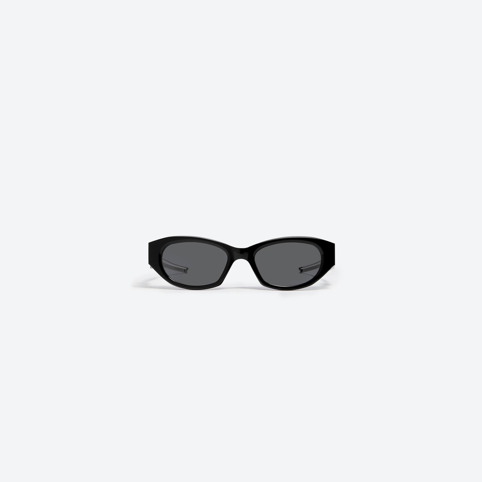 A front view of Gentle Monster Moncler - Swipe 2 01 Black Mixed framed Cat-eye sunglasses.
