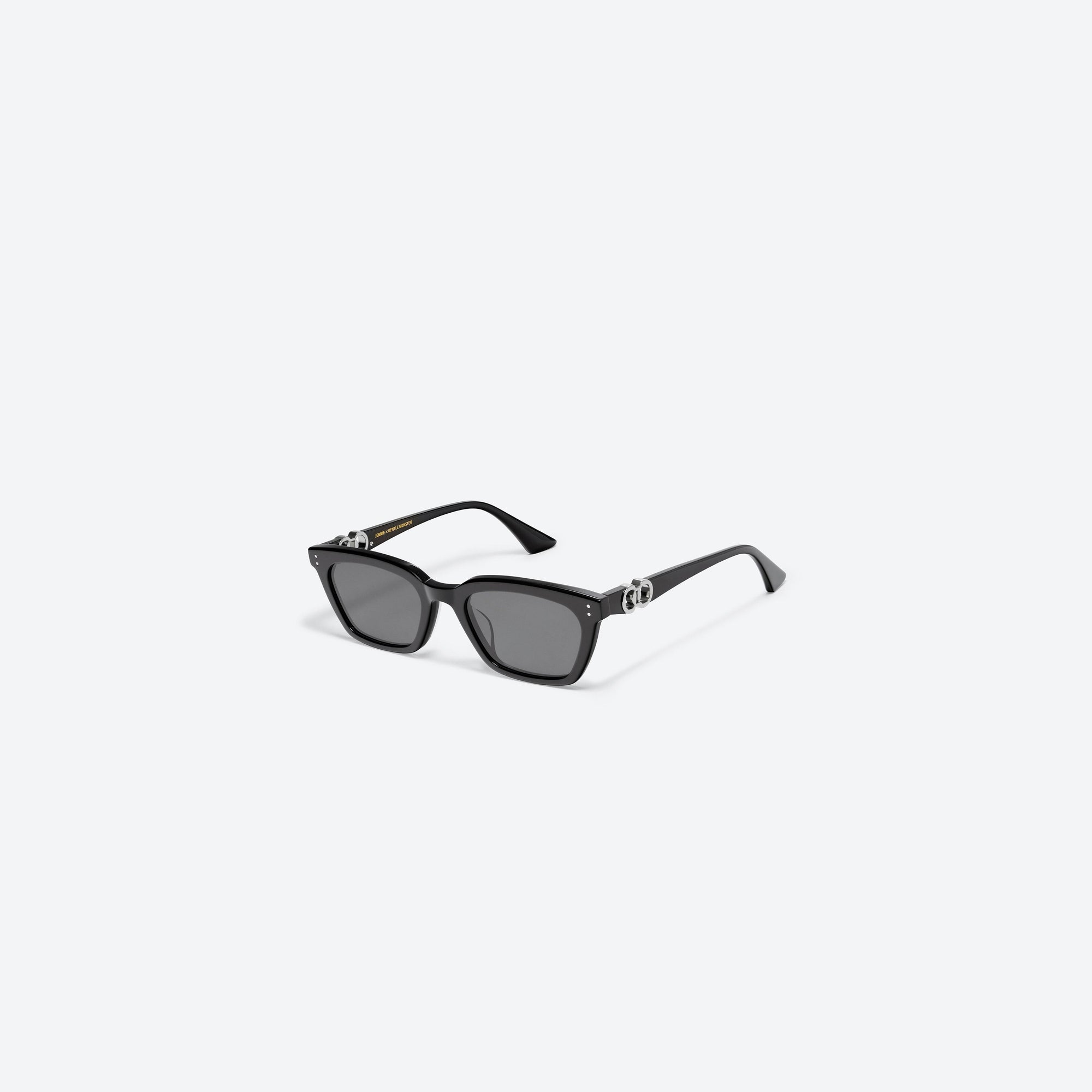 45-degree view of Gentle Monster Jennie - XOXO 01 Black Mixed framed Square sunglasses.