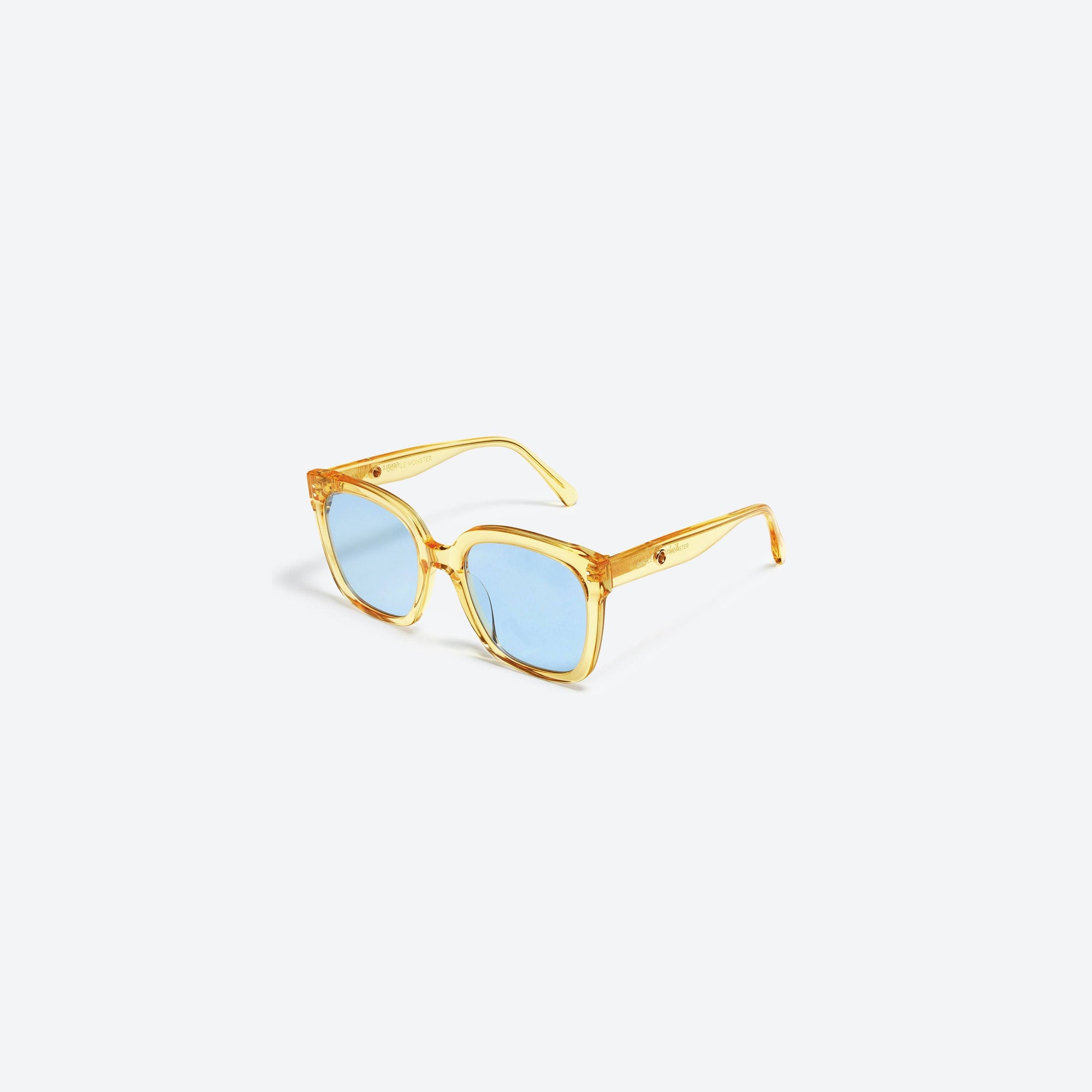 45-degree view of Gentle Monster Jennie - Kuku YC1 Yellow Acetate framed Square sunglasses.