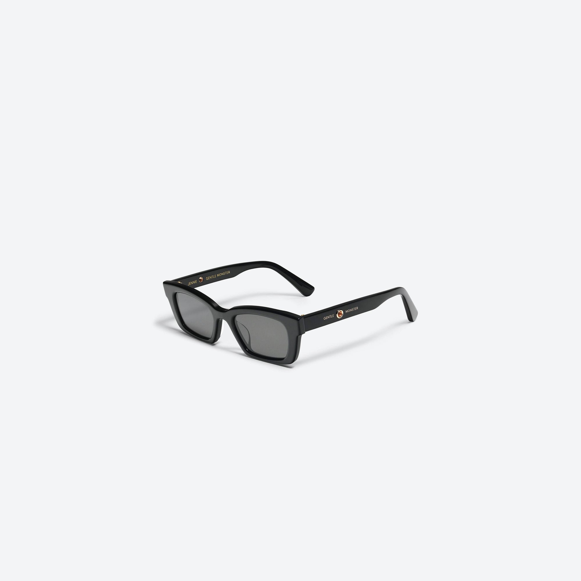 45-degree view of Gentle Monster Jennie - 1996 01 Black Acetate framed Square sunglasses.