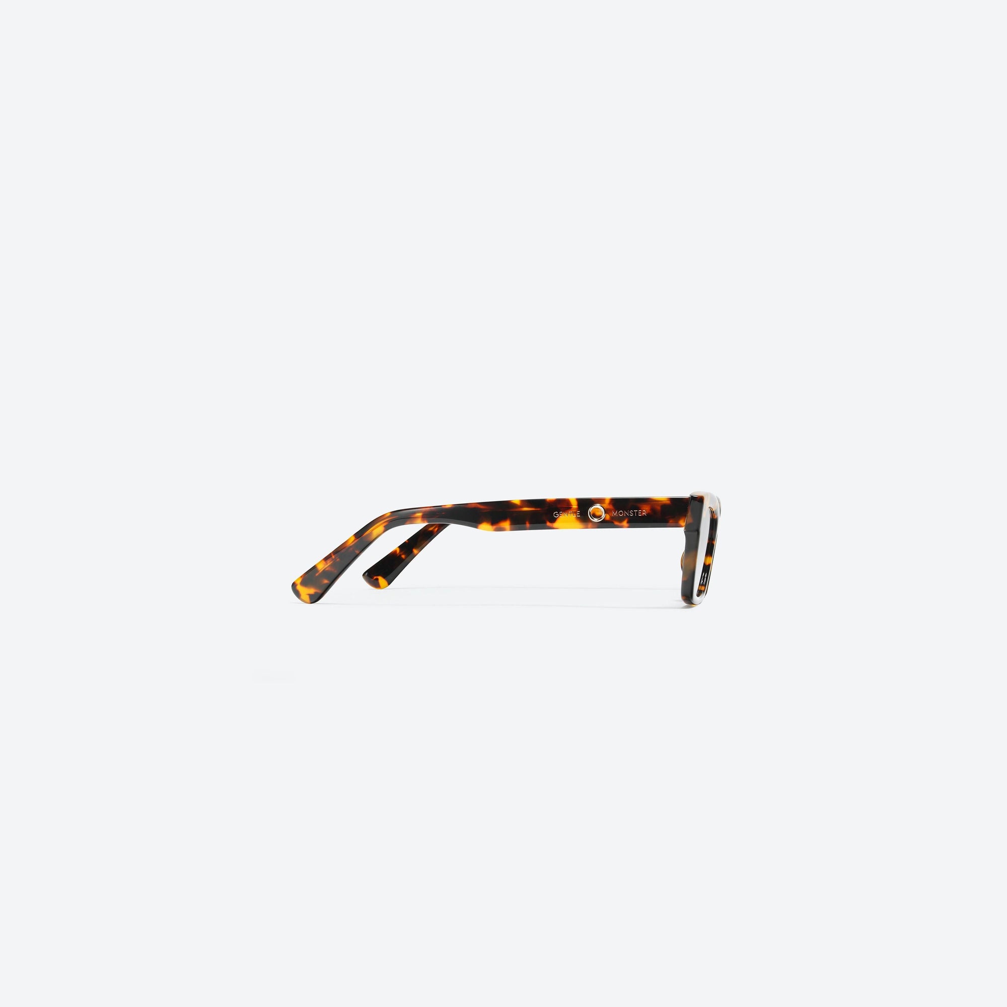 A detailed right view of Gentle Monster Jennie - 1996 033 Tortoise Acetate framed Square sunglasses.