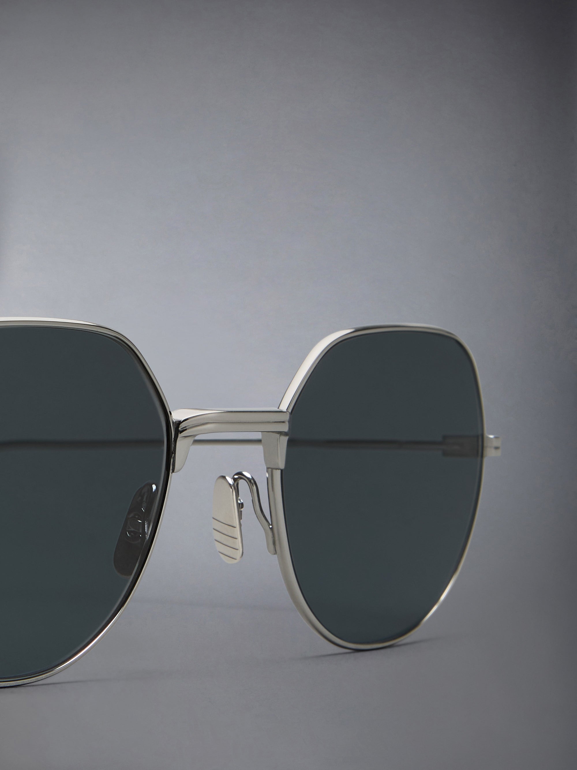 TITANIUM ROUND SUNGLASSES