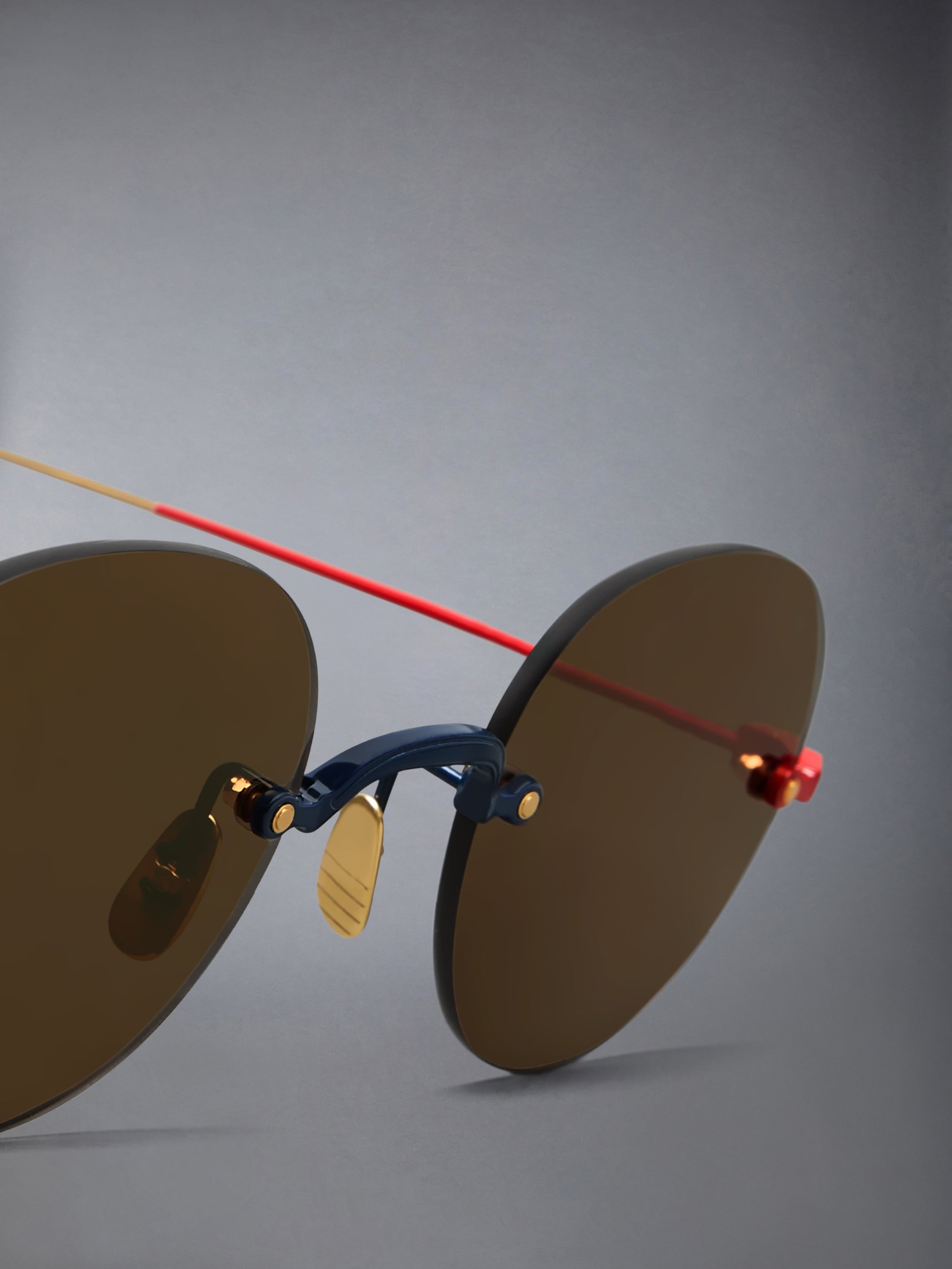 TITANIUM RIMLESS ROUND SUNGLASSES