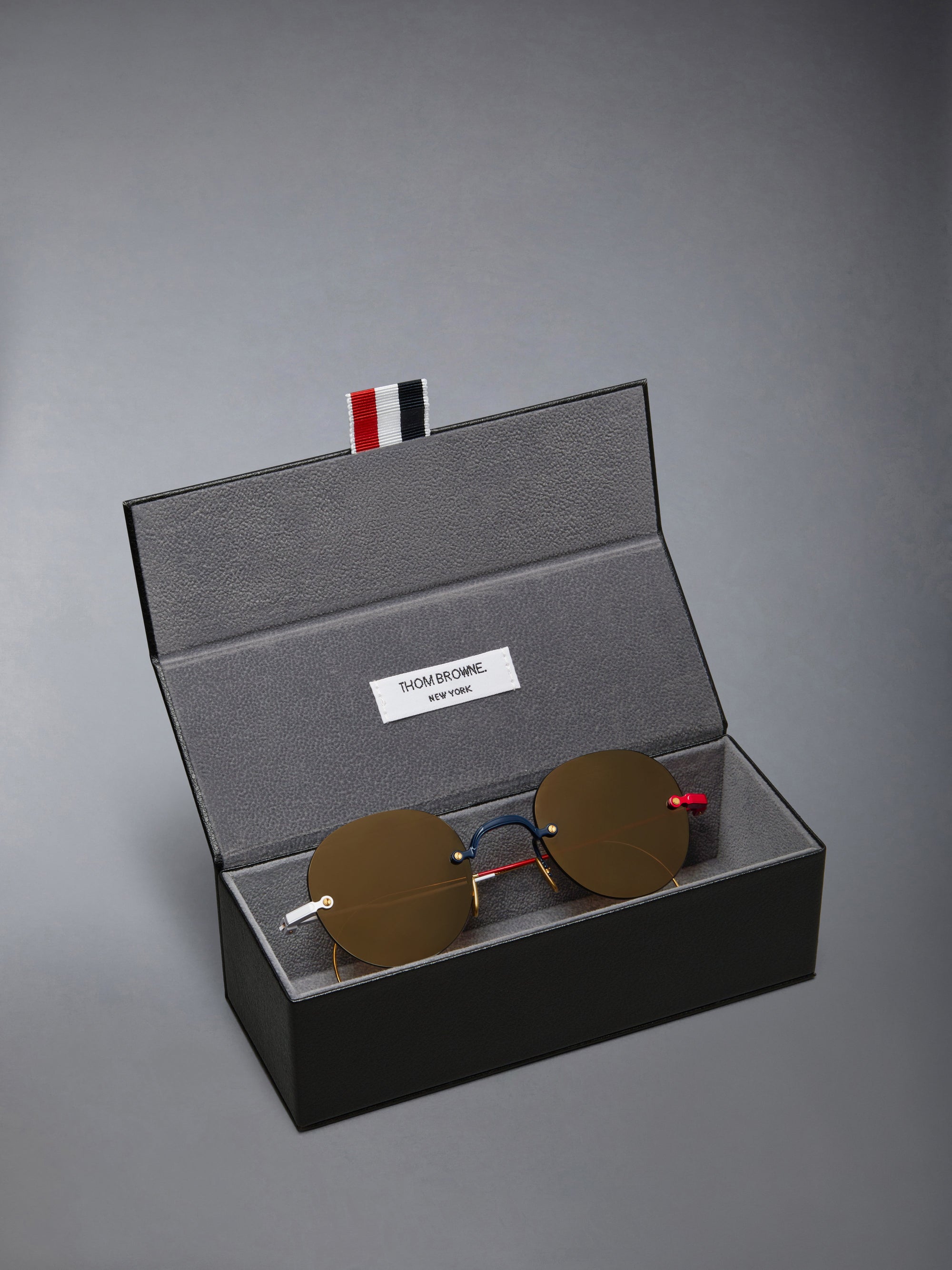 TITANIUM RIMLESS ROUND SUNGLASSES