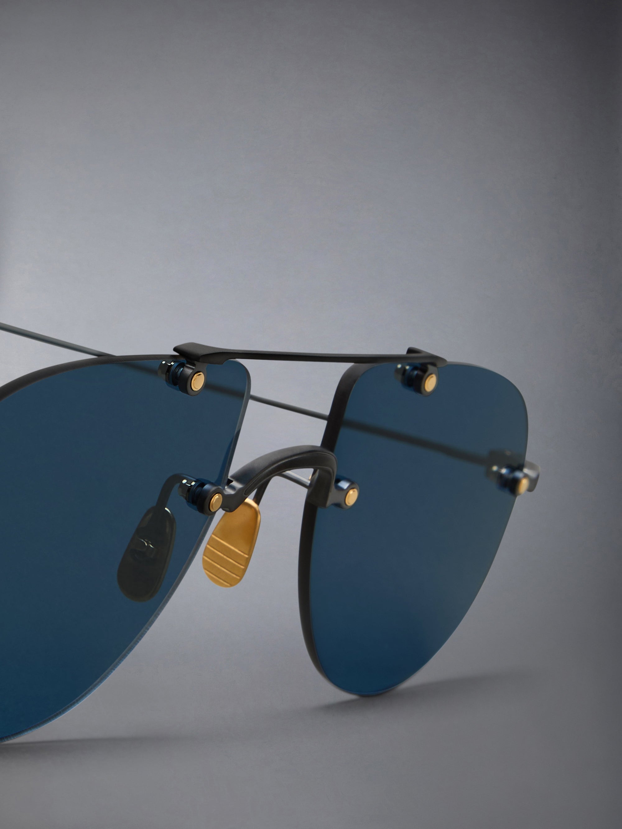 TITANIUM RIMLESS AVIATOR SUNGLASSES