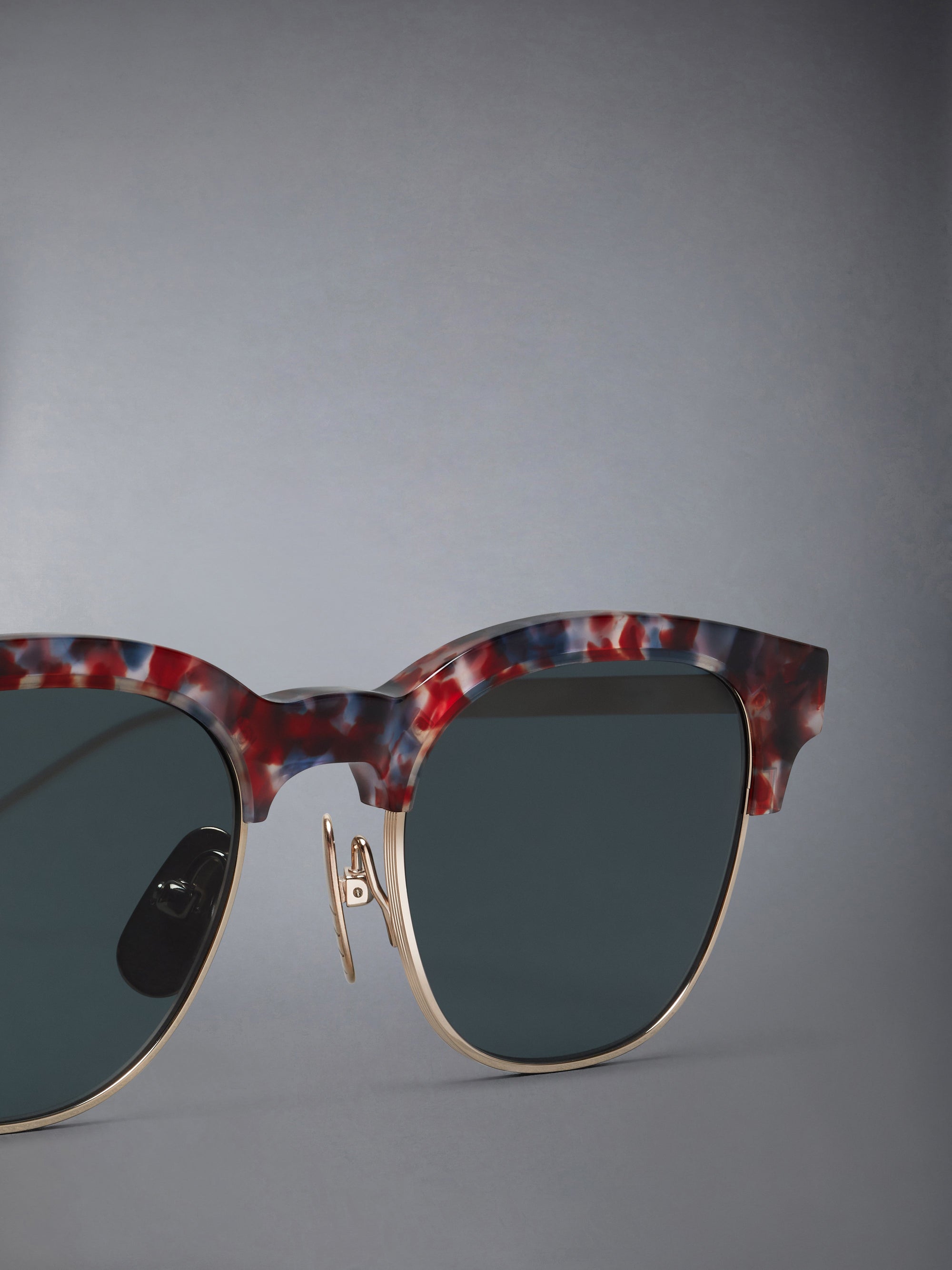 ACETATE AND TITANIUM OVAL SUNGLASSES