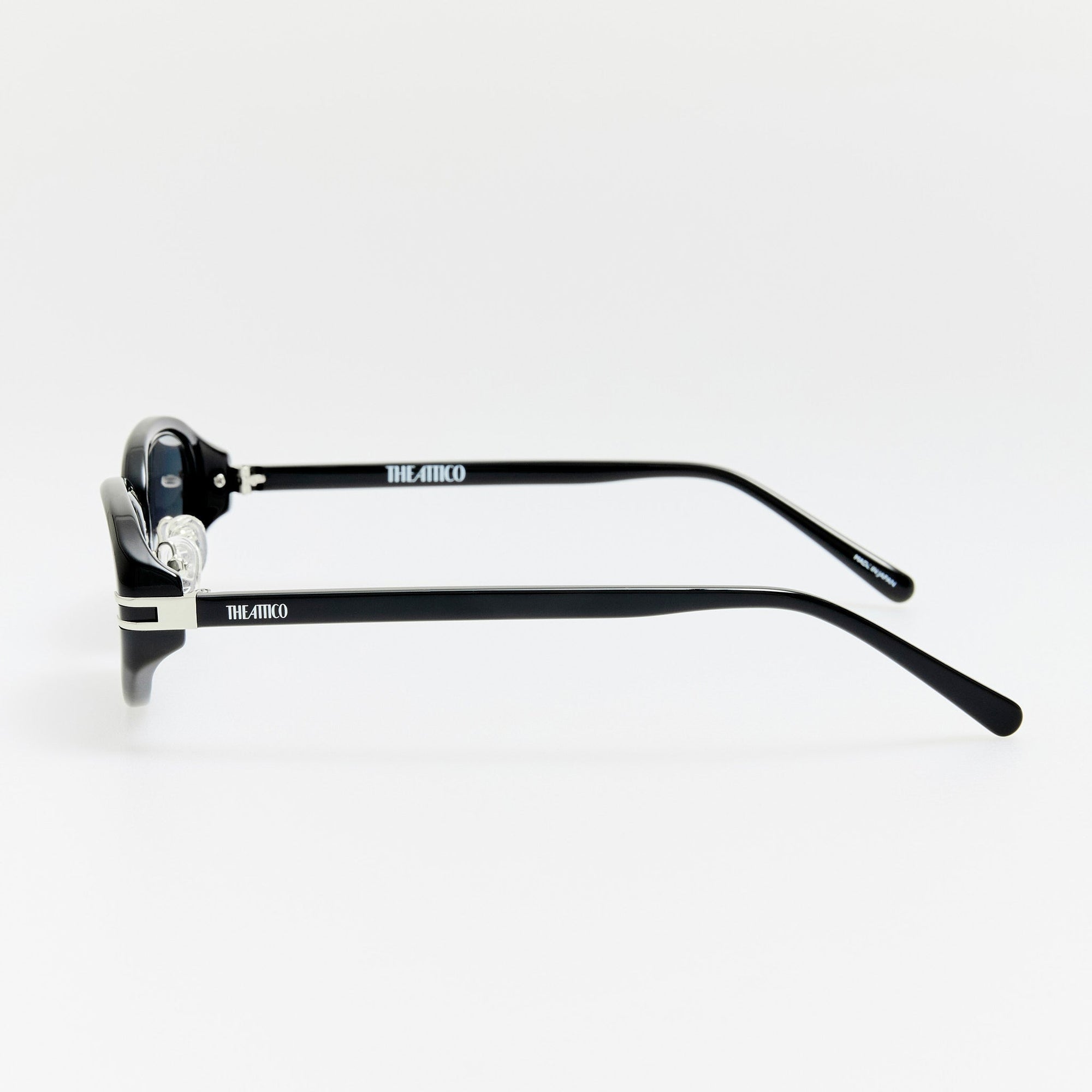 Ambra Oval Sunglasses in Black and Grey