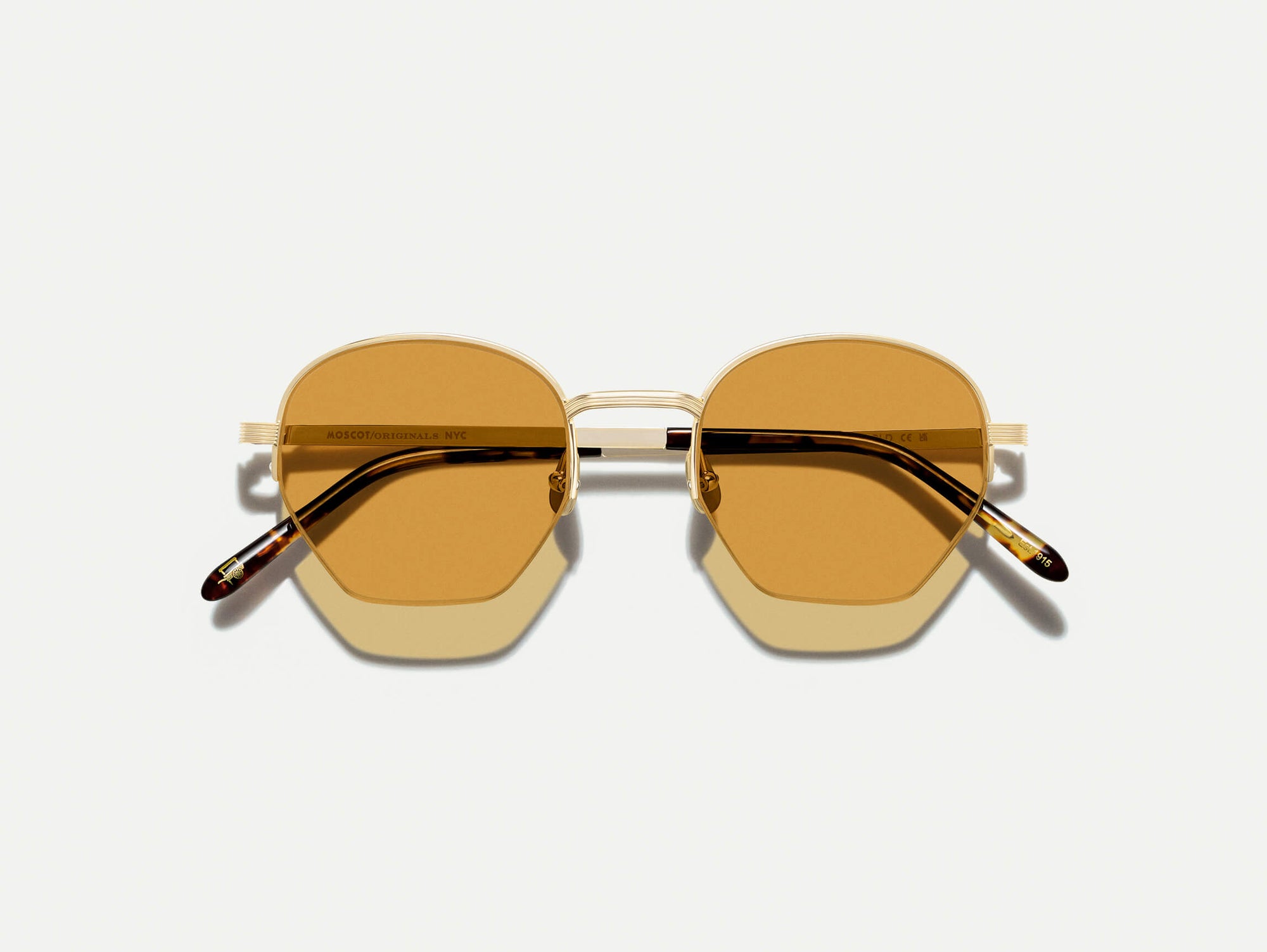Plotz Sun#gold-with-amber-lens_